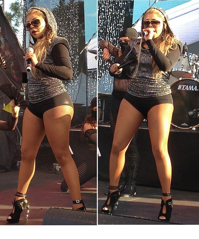 Nu are nici de departe silueta ideala, dar insista sa cante imbracata intr-un body. Vezi cum s-a facut de ras Lil Kim