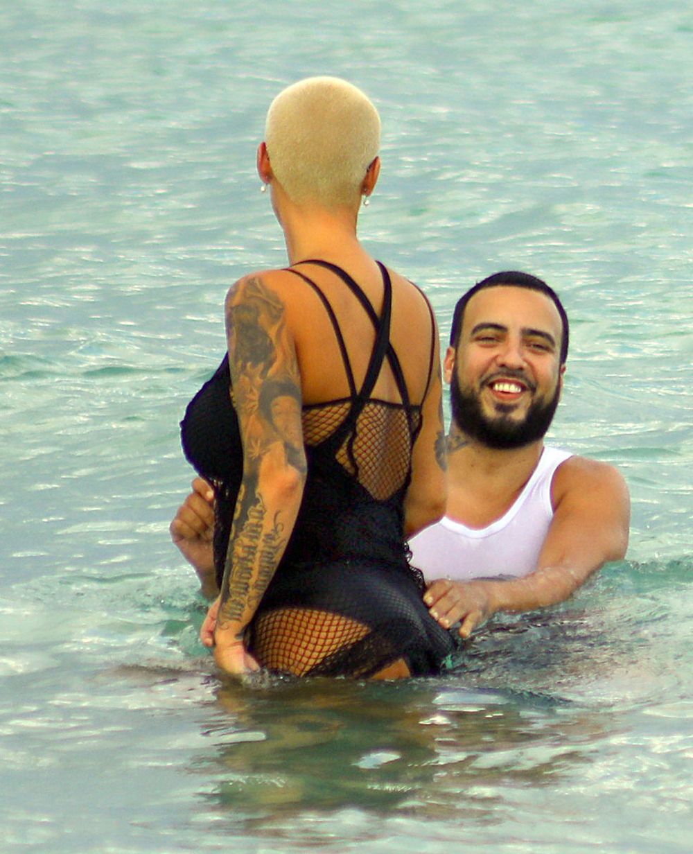 Amber Rose si French Montana, scene fierbinti pe plaja. Cum au fost surprinsi cei doi